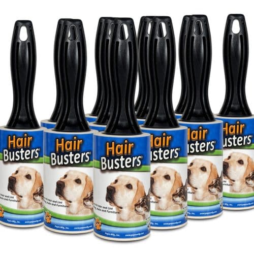 Eight bulk lint rollers with black handles are arranged in two rows. Each roller has blue packaging labeled “Hair Busters” and features a yellow dog, making them perfect commercial lint rollers for removing pet hair.